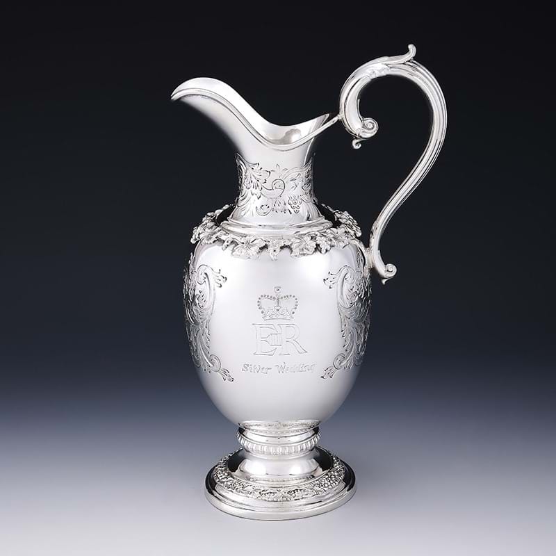 A cased limited edition silver commemorative jug, Garrard & Co. Ltd., London 1972, no. 69 of 250
